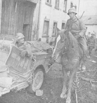 Discussing the relative merit of the jeep and the horse for M.P. patrols.