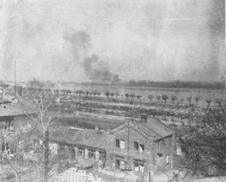 The smoke is from American shells landing in Kastel, Germany.