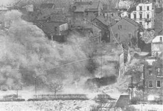 Third Army shells landing in Bingen, Germany.