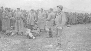 German Prisoners of War in a round-up field near Cham, Germany.