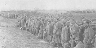 German Prisoners of War in a round-up field near Cham, Germany.
